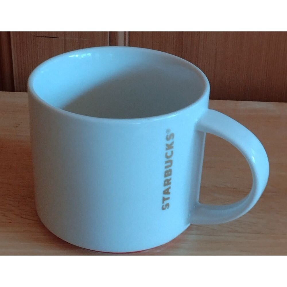 2012 Starbucks  16 oz. Coffee Tea Cup Mug Gold Lettering Red Trim Ring At Bottom